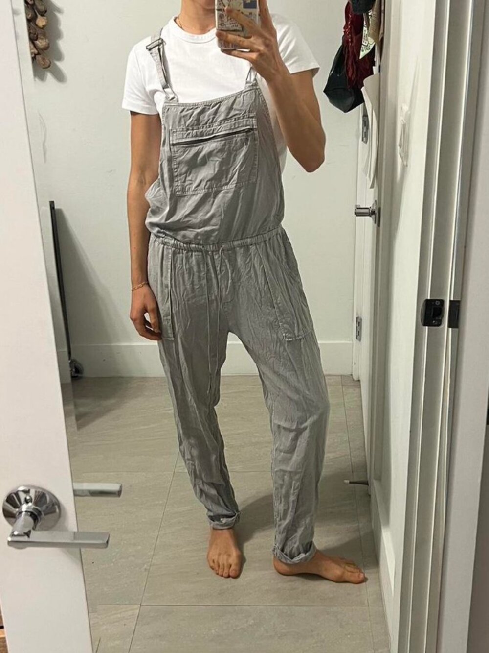 Gray cotton overalls with pockets and cinch waist detail with drawstring